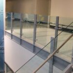 Axis – Side-mounted glazed railing panel fitting